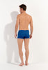 General view of a men model wearing HO blue print  Swim Shorts