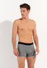 Front view of a men model wearing HO black print modal/viscose/tencel Comfort Boxer Briefs