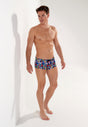 General view of a men model wearing HO multico print  Swim Trunk