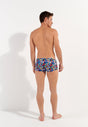 General view of a men model wearing HO multico print  Swim Trunk