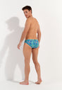 General view of a men model wearing HO blue print  Swim Mini Briefs