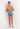 Full-body view of a men model wearing HO blue print  Swim Shorts