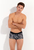 Front view of a men model wearing HO dark grey print  Trunk