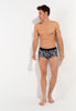 Full-body view of a men model wearing HO dark grey print  Trunk