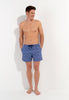 Full-body view of a men model wearing HO navy print  Beach Boxer