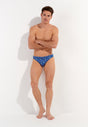 Full-body view of a men model wearing HO navy print  Swim Micro Briefs