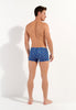 General view of a men model wearing HO navy print  Swim Shorts