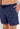 Close-up view of a men model wearing HO navy print  Beach Boxer