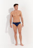 Full-body view of a men model wearing HO navy print  Swim Mini Briefs
