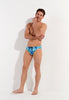 Full-body view of a men model wearing HO blue print  Swim Mini Briefs