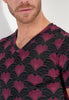 Close-up view of a men model wearing HO bordeaux print  Tee-Shirt V Neck