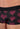 Close-up view of a men model wearing HO bordeaux print  Trunk
