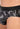 Close-up view of a men model wearing HO black print modal/viscose/tencel Mini Briefs