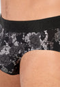 Close-up view of a men model wearing HO black print modal/viscose/tencel Mini Briefs