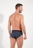 Back view of a men model wearing HO navy print modal/viscose/tencel Mini Briefs