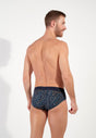 Back view of a men model wearing HO navy print modal/viscose/tencel Mini Briefs