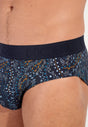 Close-up view of a men model wearing HO navy print modal/viscose/tencel Mini Briefs