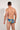 Back view of a men model wearing HO turquoise print  Tanga Briefs