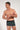 Front view of a men model wearing HO black print  Trunk
