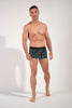 Full-body view of a men model wearing HO black print  Trunk