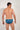 Back view of a men model wearing HO navy blue print  Comfort Micro Briefs