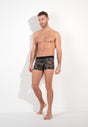 Full-body view of a men model wearing HO khaki print  Trunk