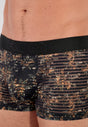Close-up view of a men model wearing HO khaki print  Trunk