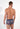 Back view of a men model wearing HO multico print  Trunk