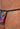 Close-up view of a men model wearing HO multico print  G-String