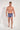 Full-body view of a men model wearing HO blue stripes  Boxer Briefs