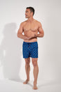 Full-body view of a men model wearing HO navy print  Beach Boxer