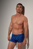 General view of a men model wearing HO navy print  Swim Shorts