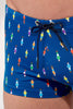 Close-up view of a men model wearing HO navy print  Swim Shorts