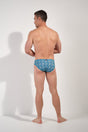 General view of a men model wearing HO blue print  Swim Mini Briefs