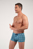 Front view of a men model wearing HO blue print  Swim Shorts