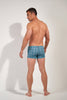 General view of a men model wearing HO blue print  Swim Shorts