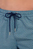 Close-up view of a men model wearing HO blue print  Beach Boxer