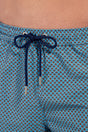 Close-up view of a men model wearing HO blue print  Beach Boxer