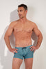Front view of a men model wearing HO blue print  Swim Shorts