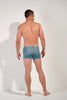 General view of a men model wearing HO blue print  Swim Shorts