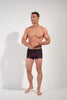 Full-body view of a men model wearing HO red print modal/viscose/tencel Trunk