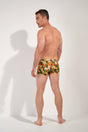 General view of a men model wearing HO navy print  Swim Shorts