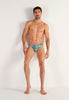 Full-body view of a men model wearing HO multico print  Comfort Micro Briefs