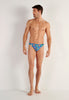 Full-body view of a men model wearing HO blue print  G-String