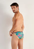 Back view of a men model wearing HO multico print  Tanga Briefs