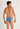 Back view of a men model wearing HO blue print  Tanga Briefs