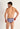 Back view of a men model wearing HO navy print  Tanga Briefs