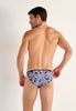 Back view of a men model wearing HO navy print  Tanga Briefs