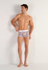 Full-body view of a men model wearing HO white print  Trunk