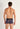 Back view of a men model wearing HO black print  Trunk